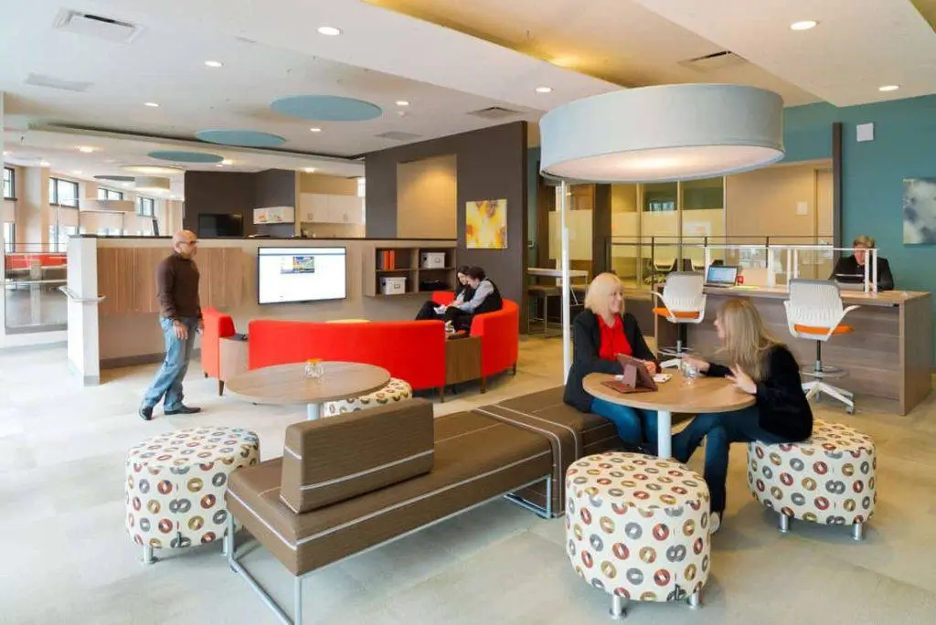 Team collaborating in a comfortable lounge