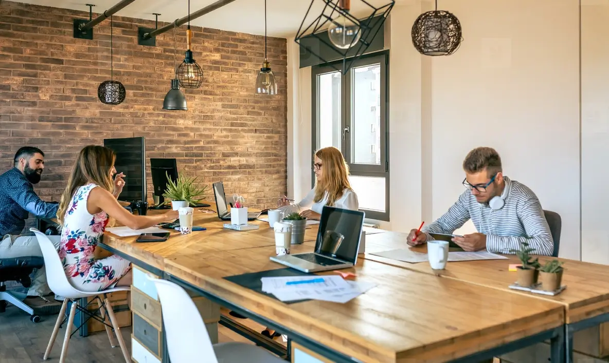 Professionals networking in a modern lounge