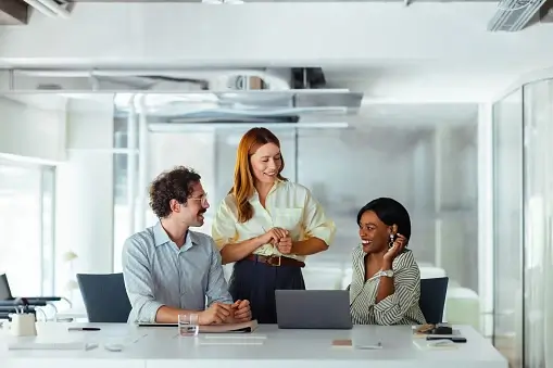 Guests looking at a bright, modern office space